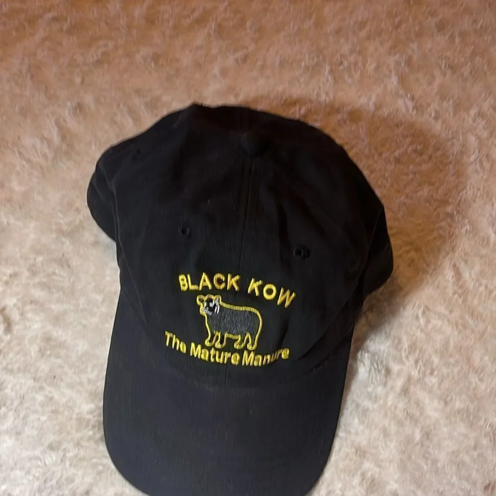 Black Kow the mature, manure hat